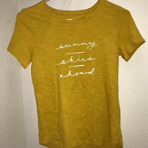 yellow "sunny skies ahead" shirt